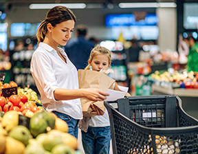 Single mom buying groceries